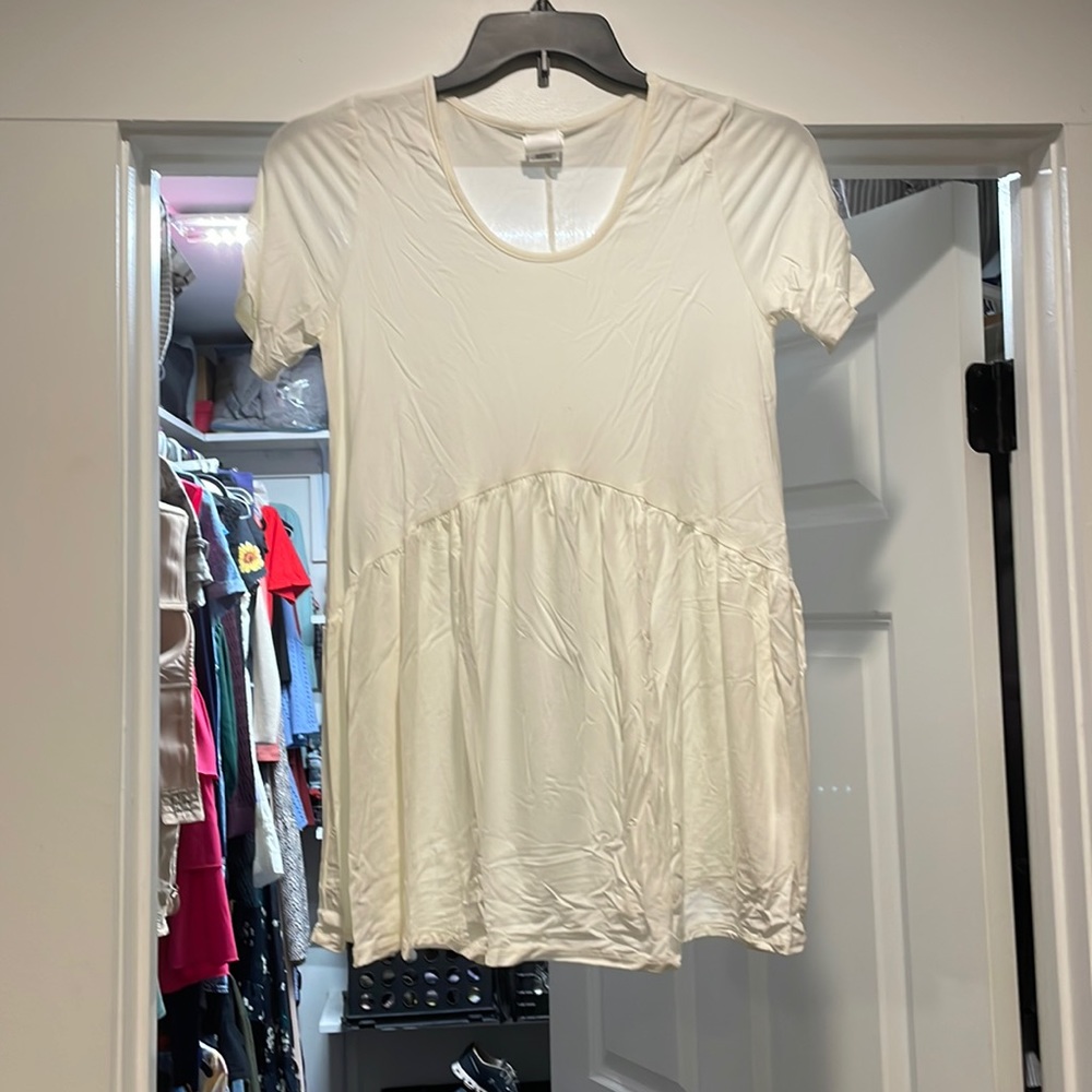White flowy top